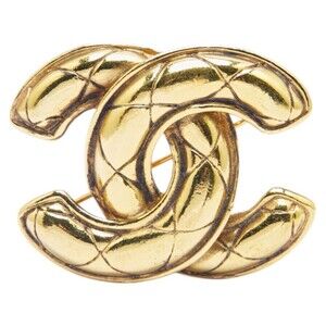 CHANEL Gold Logo Brooch